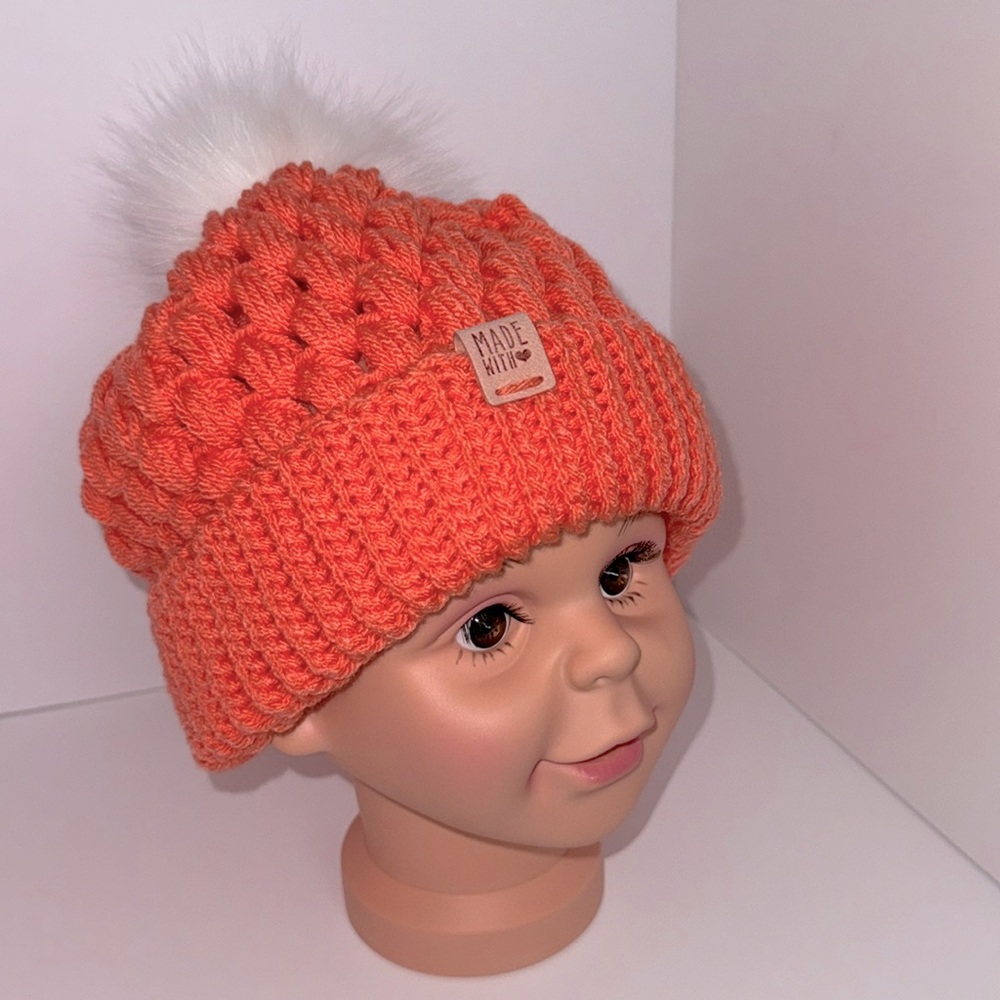 Beautiful light orange homemade crocheted hat